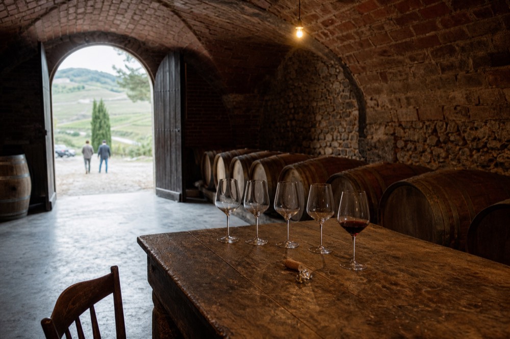 A table set for a wine tasting in a Langhe cellar.