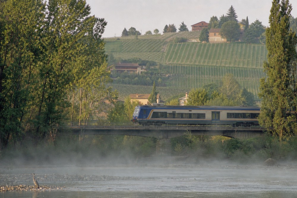 Train passing through Piedmont countryside.